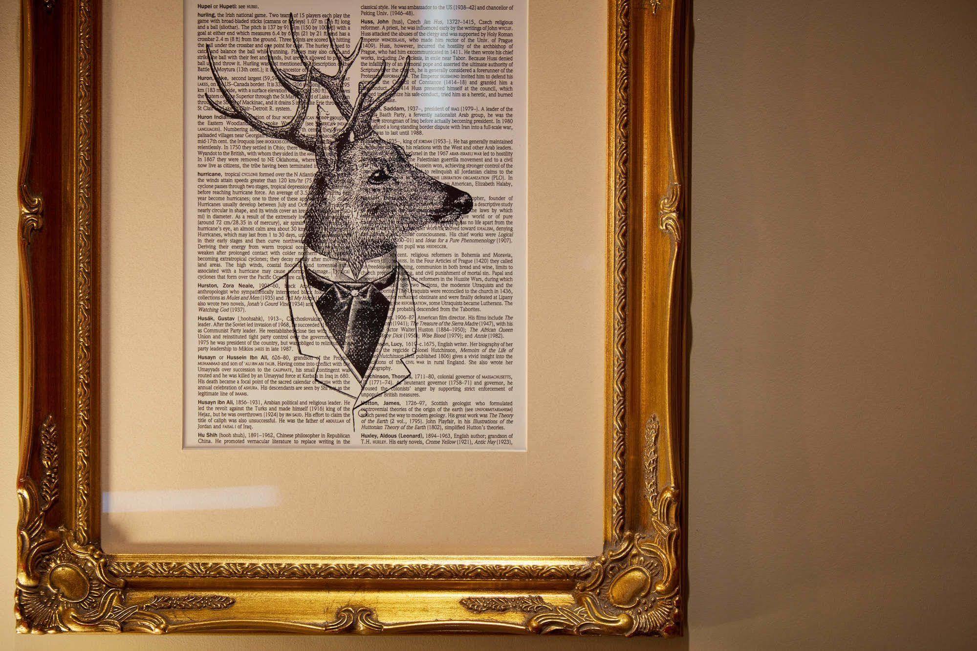 Oddfellows On The Park Cheadle  Ngoại thất bức ảnh A framed print of a deer head with a bow tie